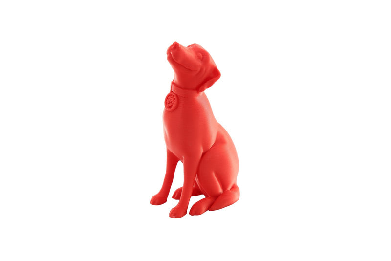 Dog figurine printed in PS Red Jessie Premium PLA on a white background