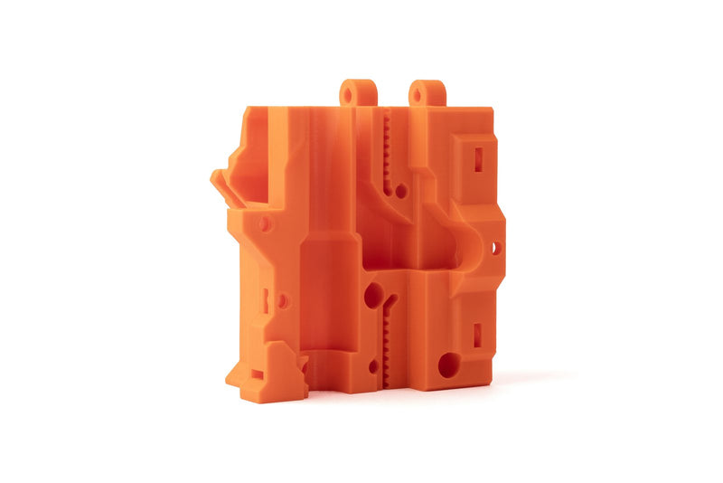 Functional block part printed in Prusa Orange Prusament PLA High Speed on a white background