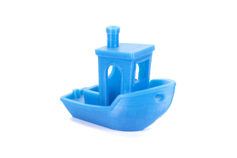 Benchy test boat printed in Azure Blue Prusament PLA on a white background